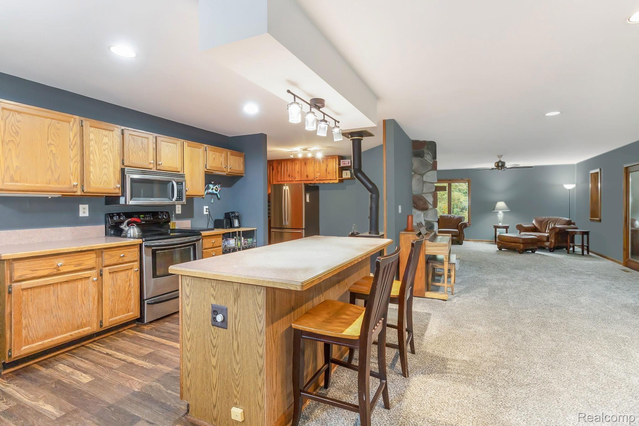 5440 Farley Road Clarkston, MI 48346 - Photo 7 of 46 KITCHEN ISLAND COUNTER SEATING.jpg