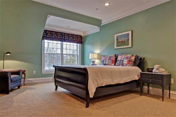 24 Hathaway Road Lexington, MA 02420 - Photo 17 of 28 a spacious bedroom with a bed and a window