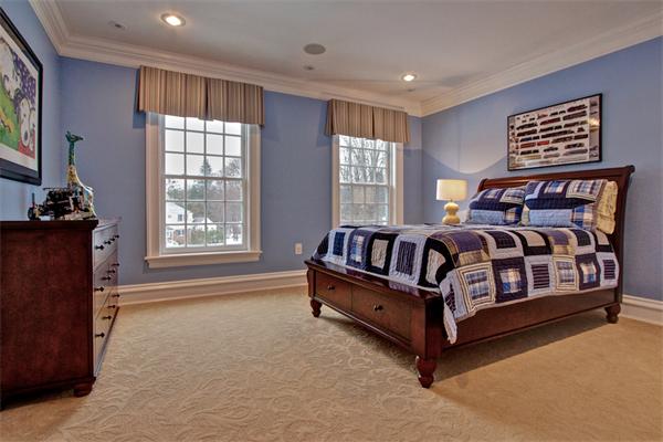 24 Hathaway Road Lexington, MA 02420 - Photo 18 of 28 a bedroom with a bed couch and window