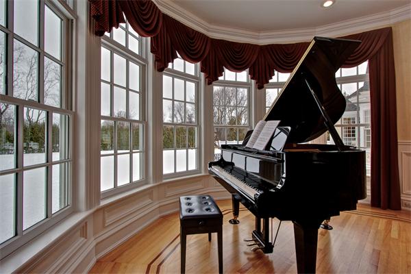 24 Hathaway Road Lexington, MA 02420 - Photo 9 of 28 a living room with furniture and a floor to ceiling window