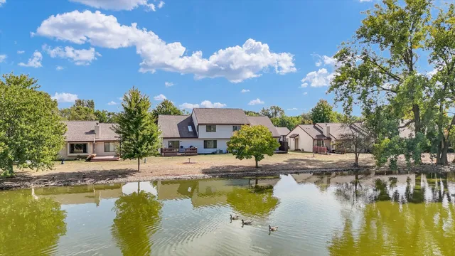 a house with a swimming pool and outdoor space