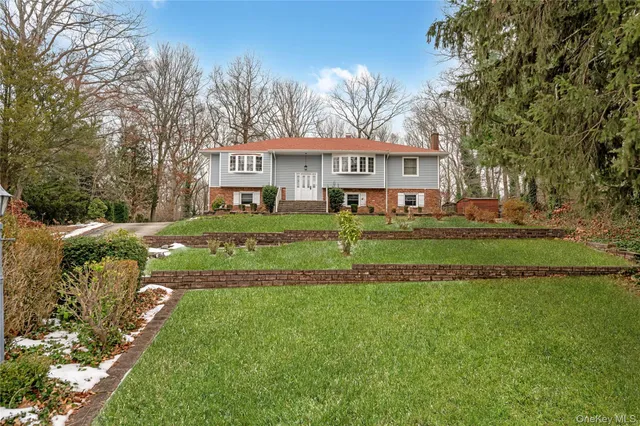 a view of a house with a big yard