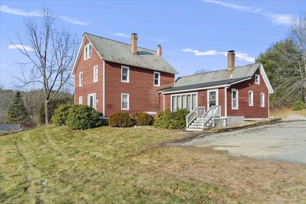 301 Torrey Road Southbridge, MA 01550 - Photo 3 of 33 a front view of a house with a yard