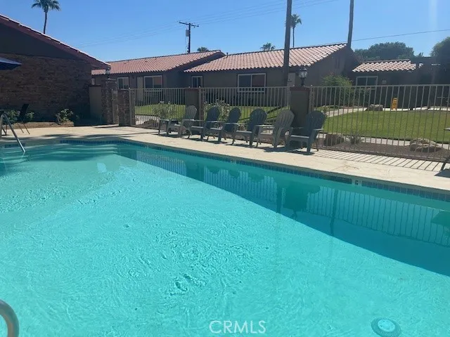 a house view with a sitting space garden