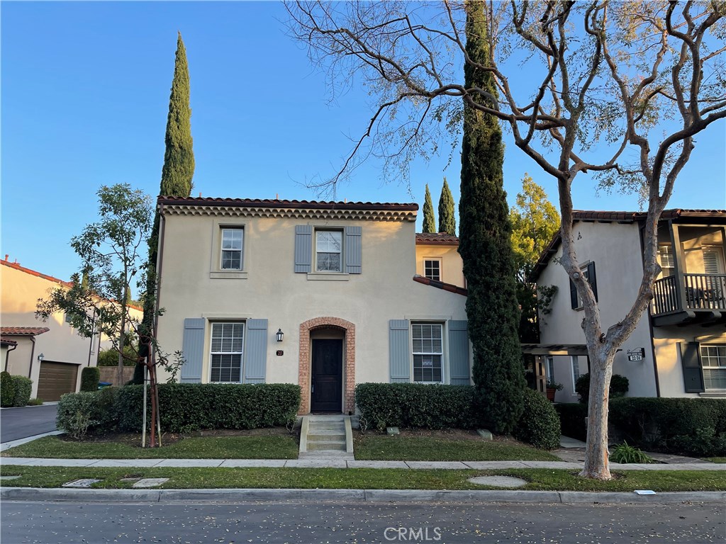 20 Arborside Irvine, CA 92603 - Photo 2 of 45 a front view of a house with a yard