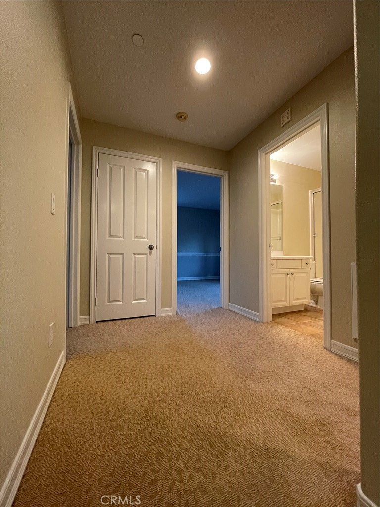 20 Arborside Irvine, CA 92603 - Photo 24 of 45 an empty room with closet and windows