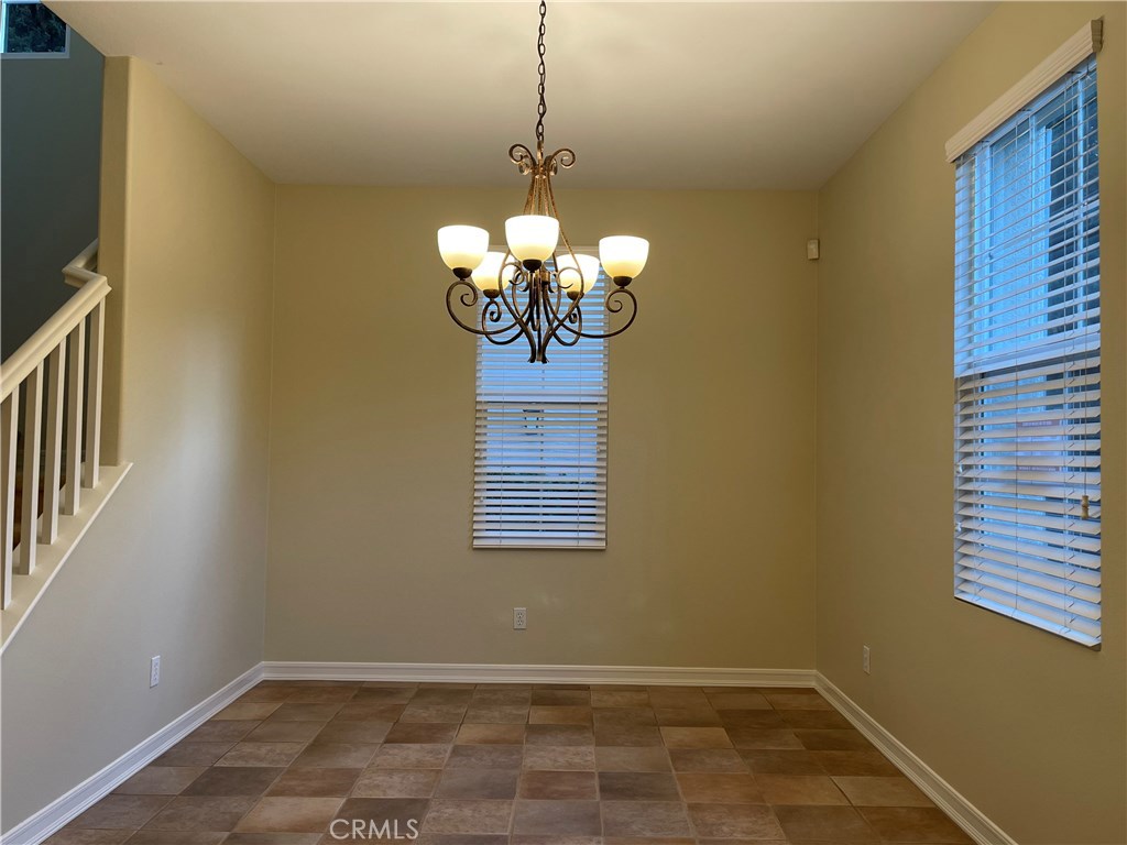 20 Arborside Irvine, CA 92603 - Photo 5 of 45 a view of a chandelier in a room with a window