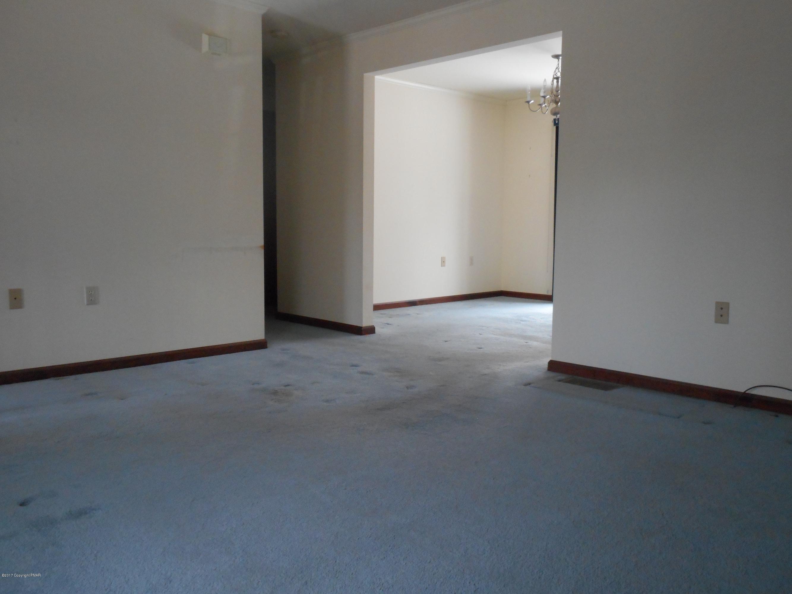 385 Blue Ridge Drive Canadensis, PA 18325 - Photo 7 of 28 Living room towards dining room