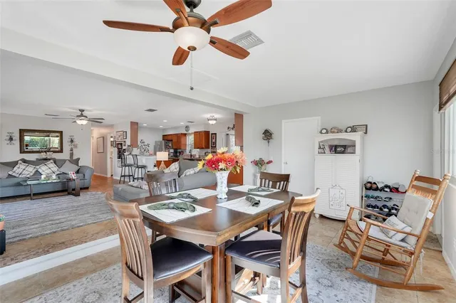 a view of a dining room with furniture