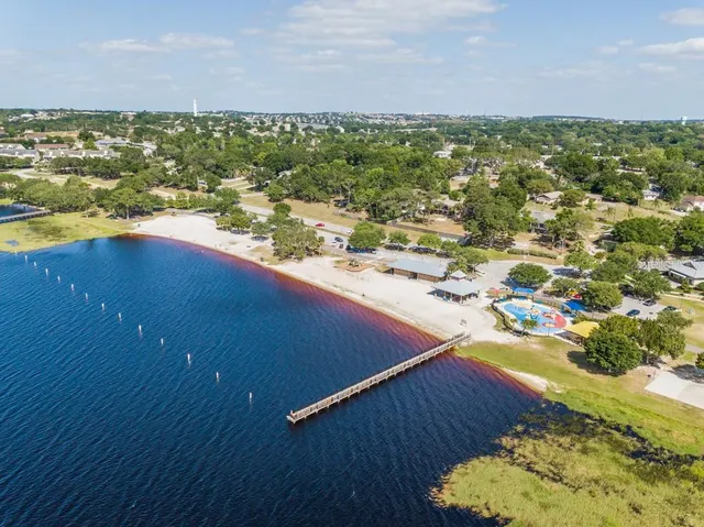 a view of a swimming pool with a lounge chairs
