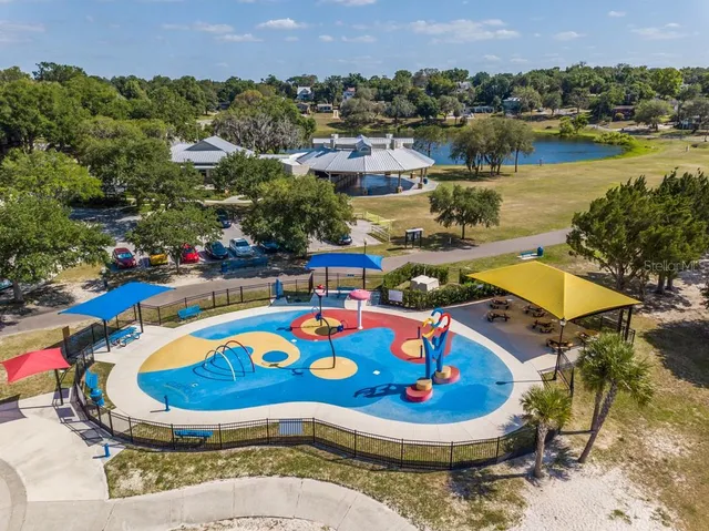 a swimming pool with a lounge chair