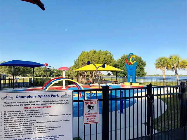 a view of a tree in a yard with a large tree