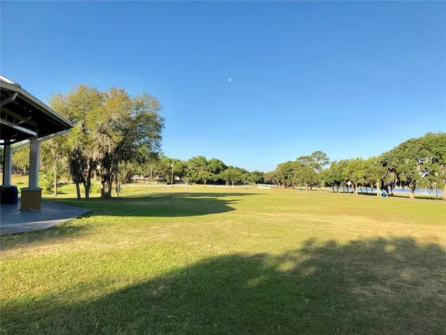 an aerial view of a house with a garden