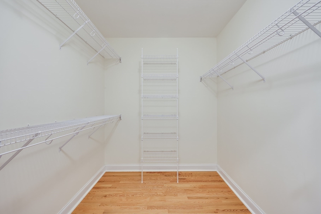 91 Reflection Drive Sandwich, MA 02563 - Photo 22 of 42 a view of a room with racks on the wall