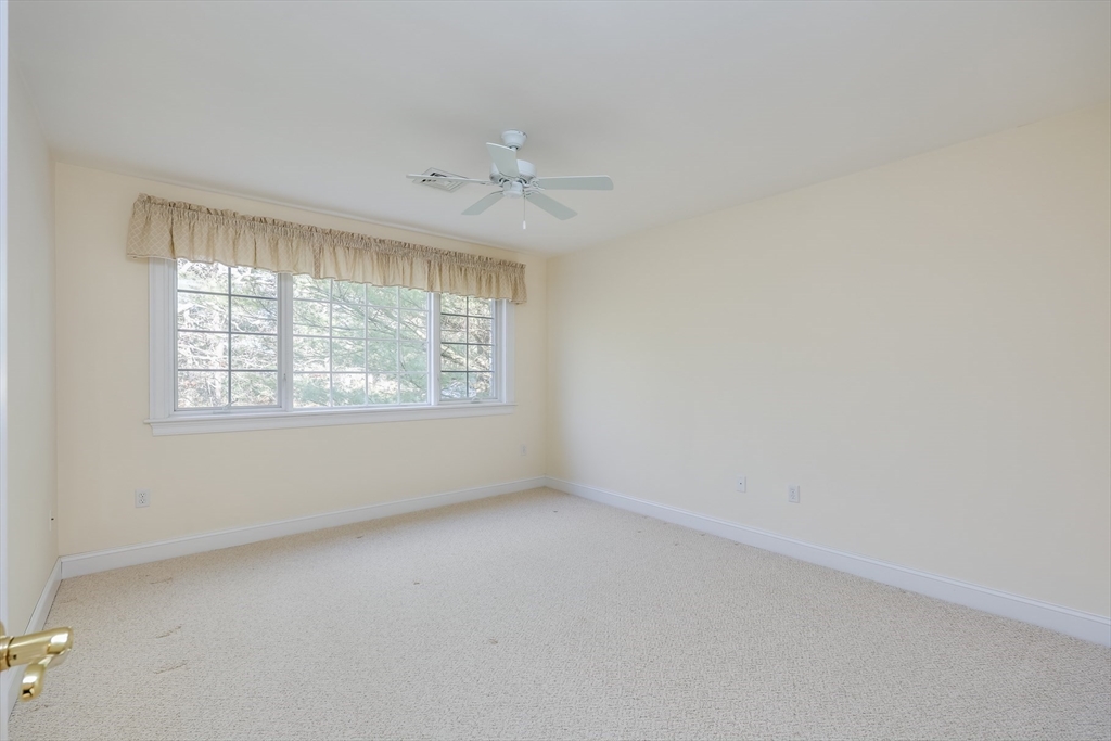91 Reflection Drive Sandwich, MA 02563 - Photo 31 of 42 an empty room with a window
