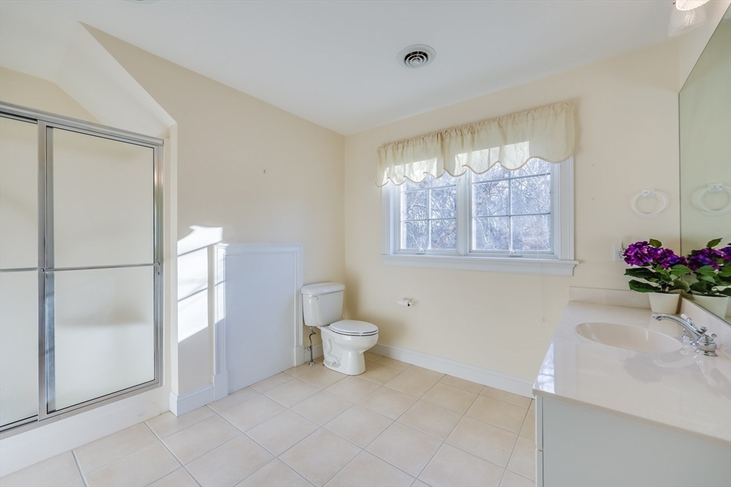 91 Reflection Drive Sandwich, MA 02563 - Photo 32 of 42 a bathroom with a toilet sink and a shower