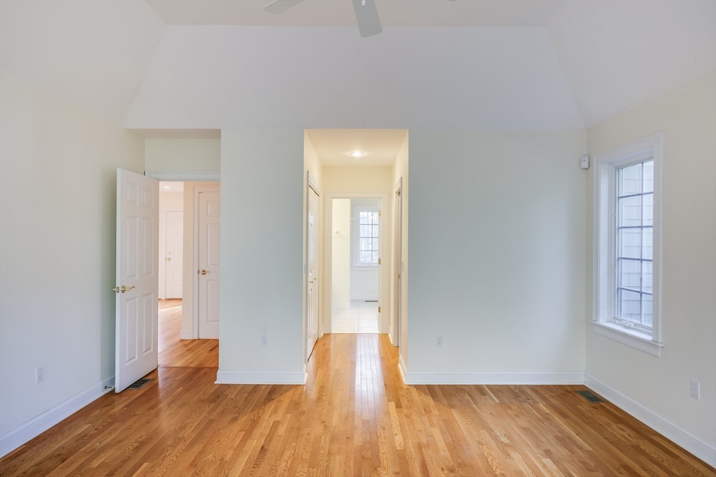 91 Reflection Drive Sandwich, MA 02563 - Photo 5 of 42 a view of empty room with wooden floor