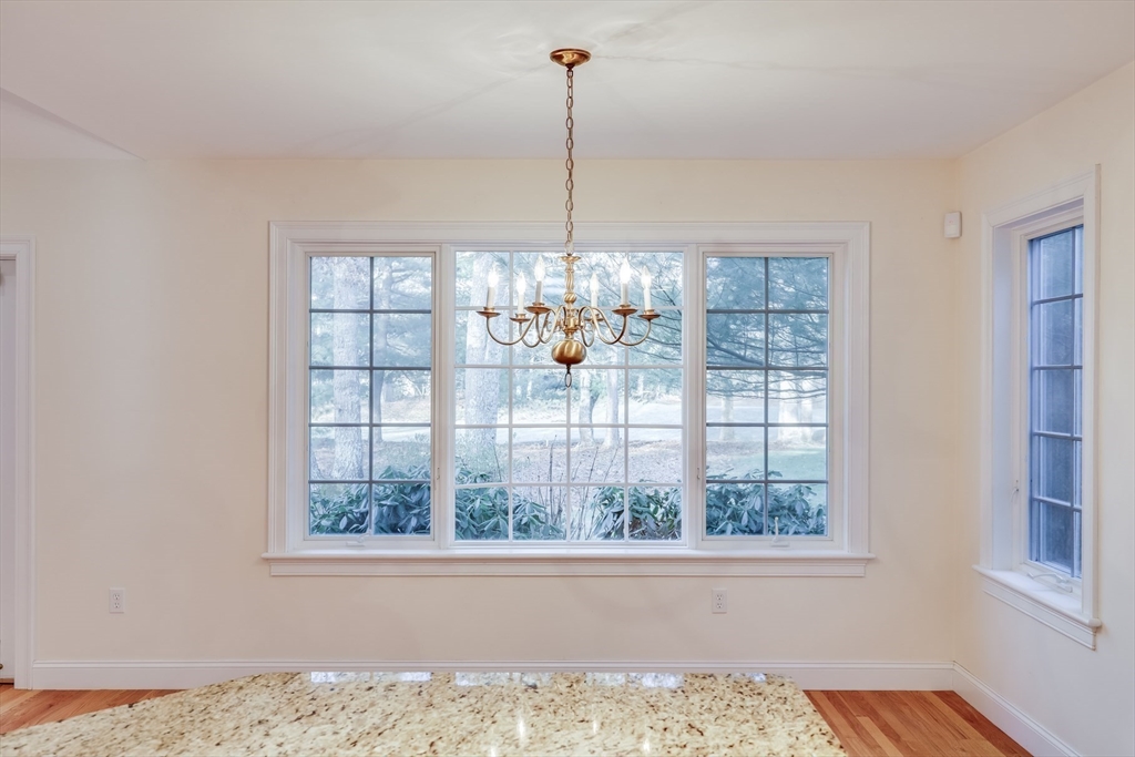 91 Reflection Drive Sandwich, MA 02563 - Photo 10 of 42 a view of a room with window and dining table