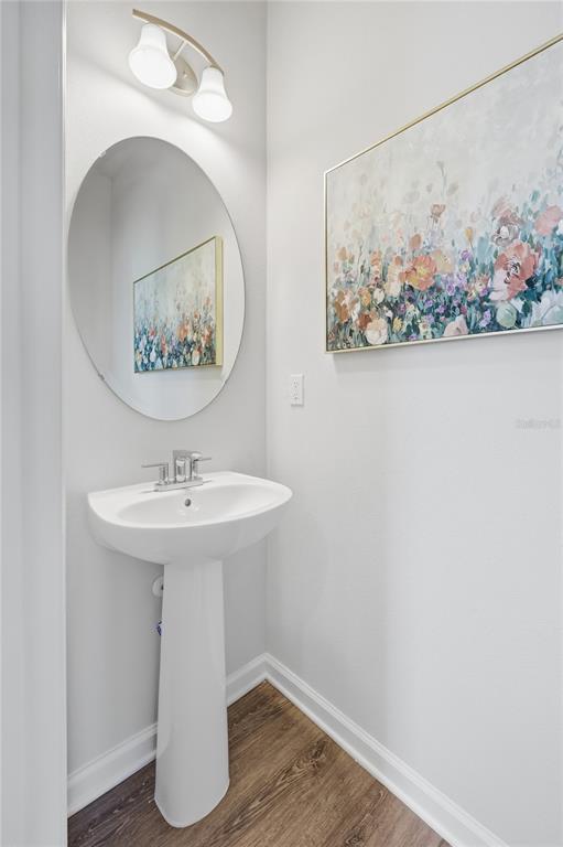 5000 Bear Lake Loop DeLand, FL 32724 - Photo 11 of 45 a bathroom with a sink and mirror