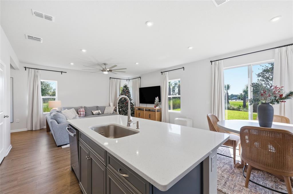 5000 Bear Lake Loop DeLand, FL 32724 - Photo 18 of 45 a large white kitchen with a large window