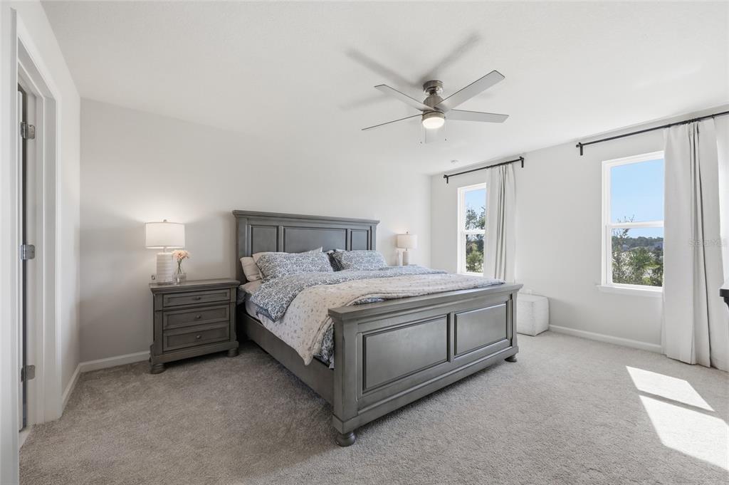 5000 Bear Lake Loop DeLand, FL 32724 - Photo 26 of 45 a bedroom with a bed and a window