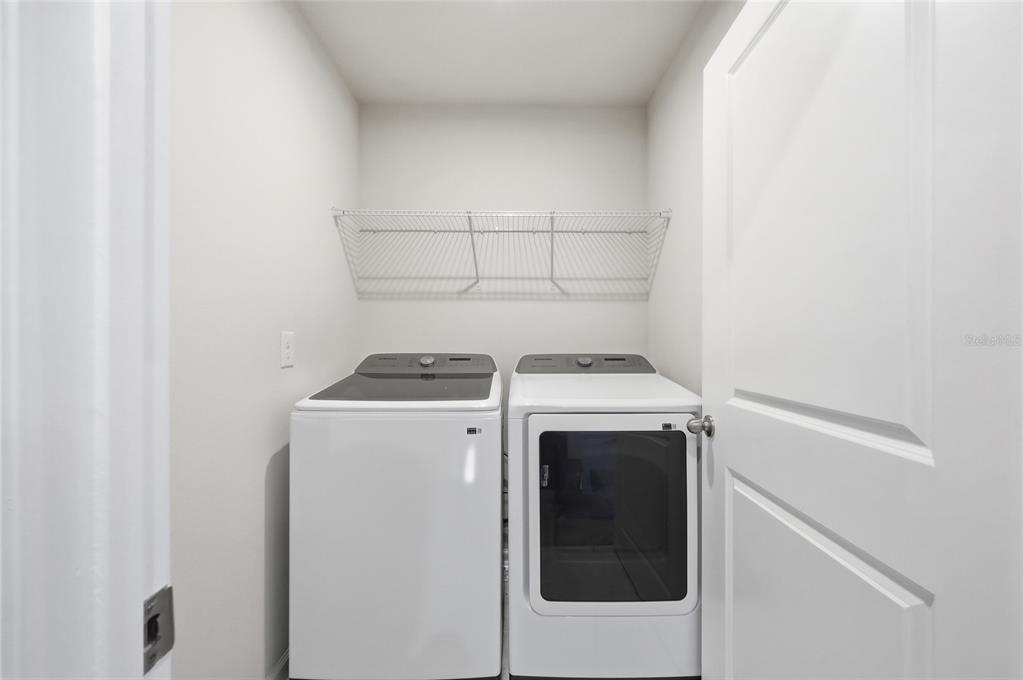 5000 Bear Lake Loop DeLand, FL 32724 - Photo 37 of 45 a utility room with dryer and washer