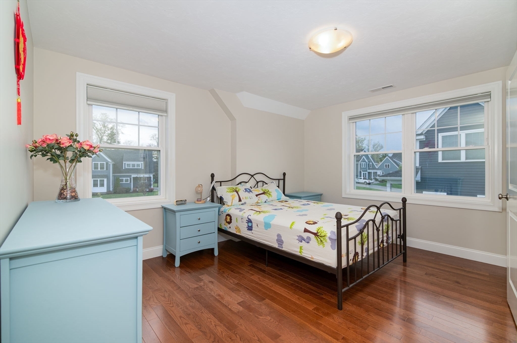 51 Tamarack Road Dracut, MA 01826 - Photo 23 of 39 a bedroom with a bed and a large window