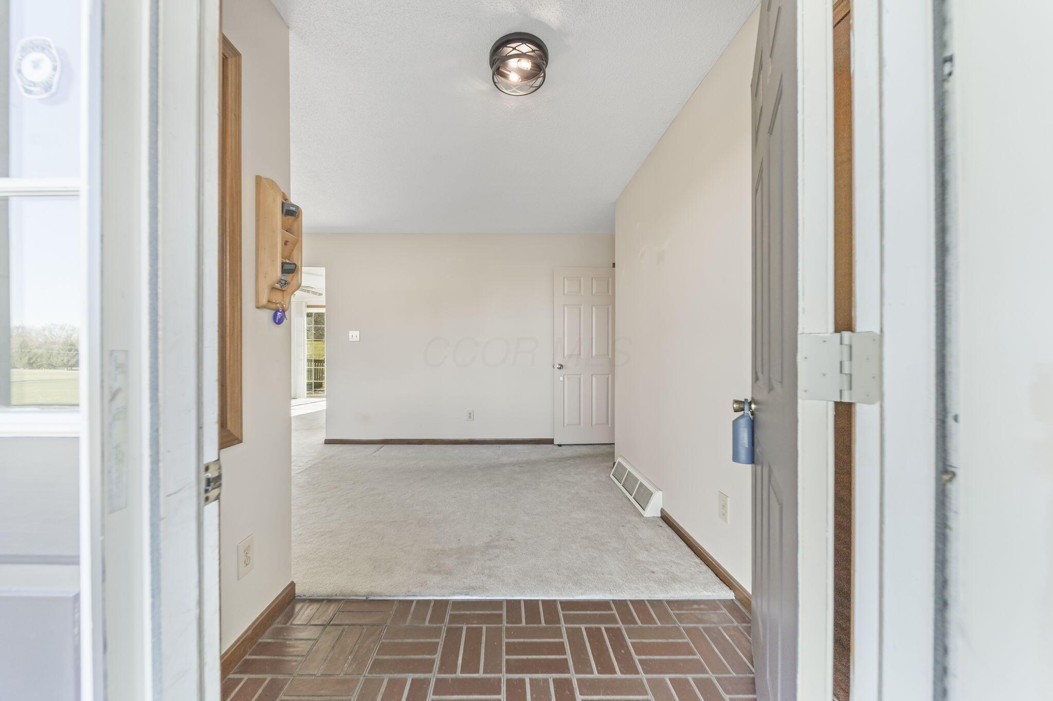 9791 Jug St Road Northwest Pataskala, OH 43062 - Photo 8 of 83 Come on in! The entryway to your next home.