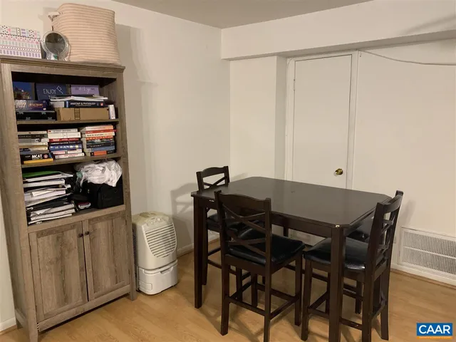 a view of a dining room with furniture