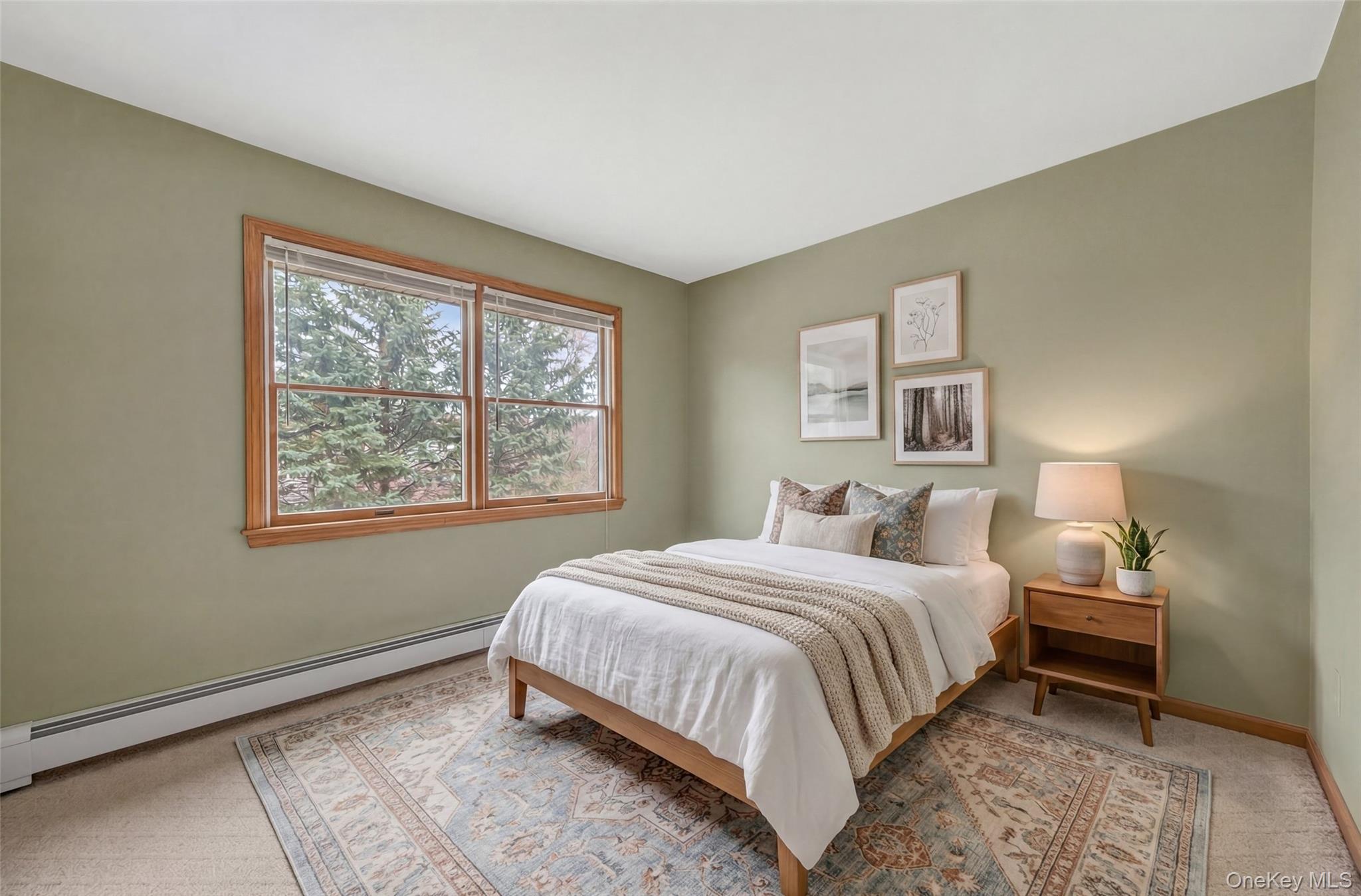 449 West Mombasha Road Monroe, NY 10950 - Photo 13 of 39 a bedroom with a bed lamp and a window