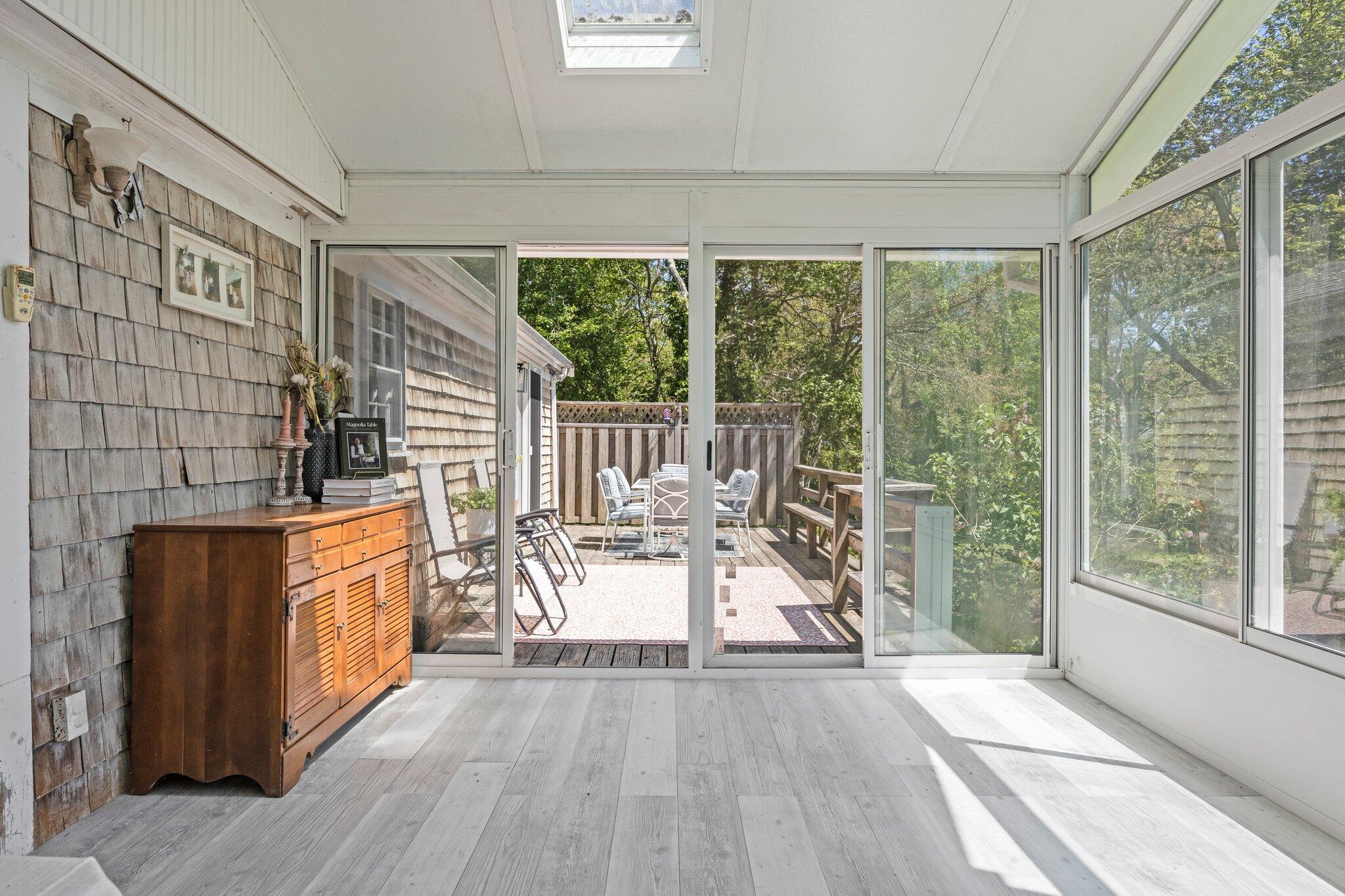 91 Sterling Road Hyannis, MA 02601 - Photo 19 of 31 a view of a balcony with wooden floor and outdoor space
