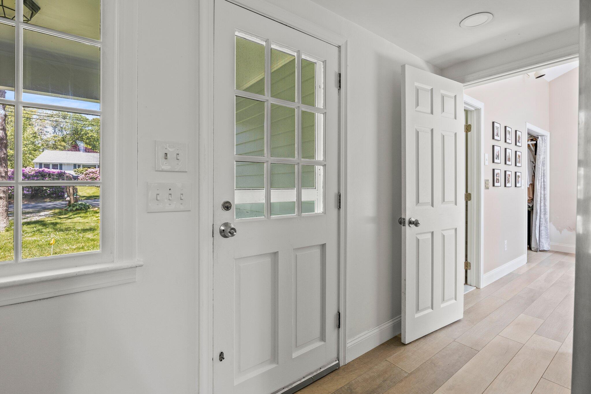 91 Sterling Road Hyannis, MA 02601 - Photo 6 of 31 a view of entryway with wooden floor and door