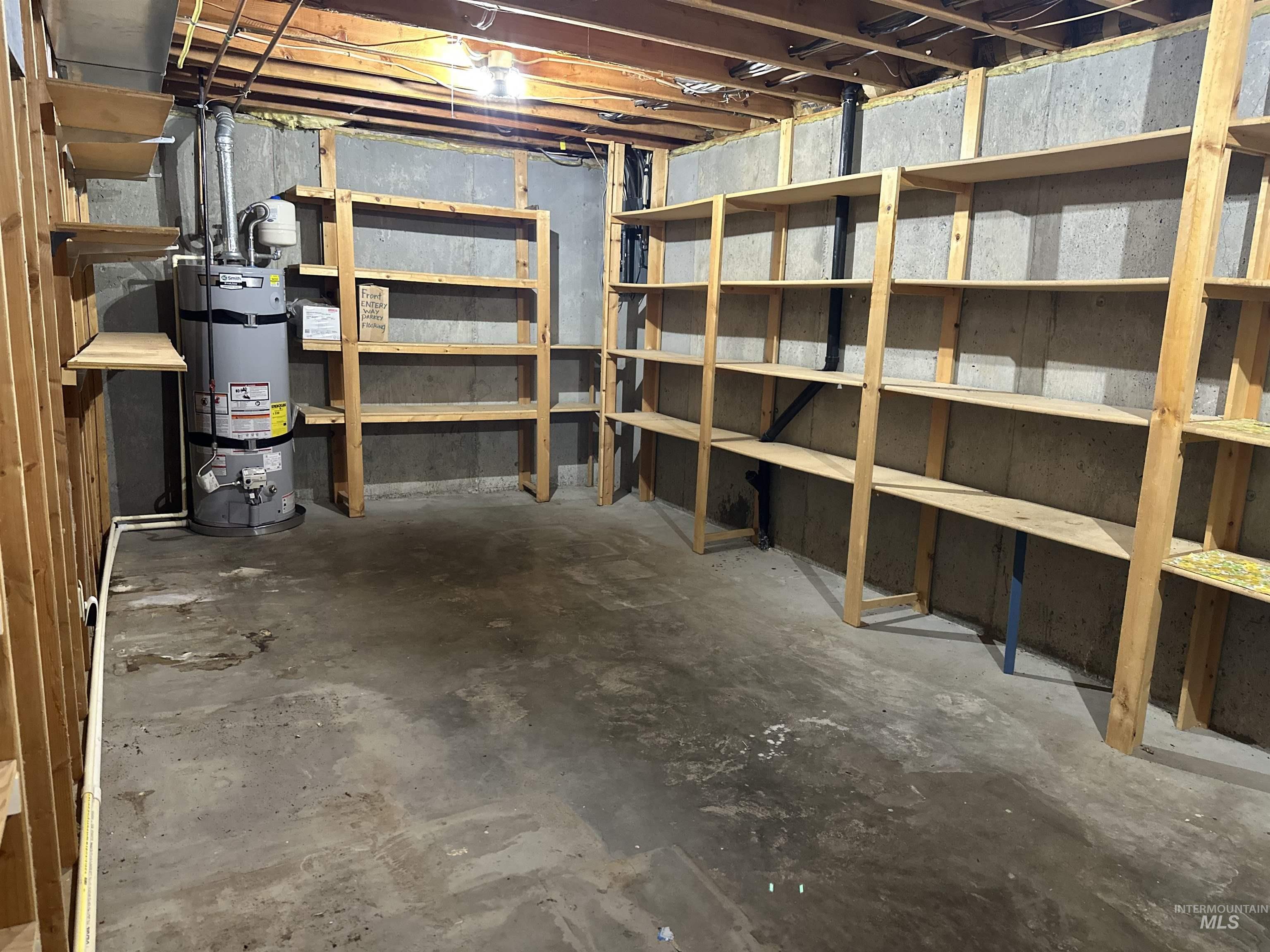 1620 6th Avenue Clarkston, WA 99403 - Photo 15 of 19 Unfinished basement space featuring concrete block walls and a concrete floor