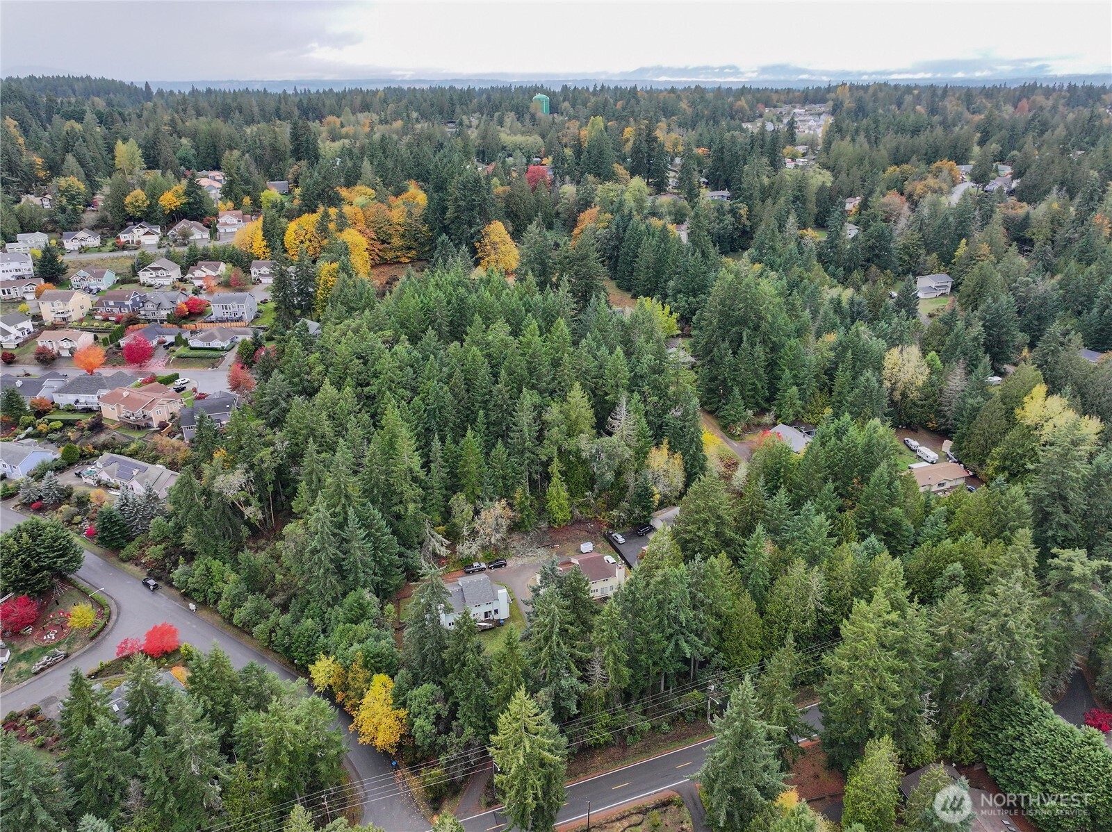6371 Illahee Road Northeast Bremerton, WA 98311 - Photo 9 of 10 an aerial view of a town with couple of houses