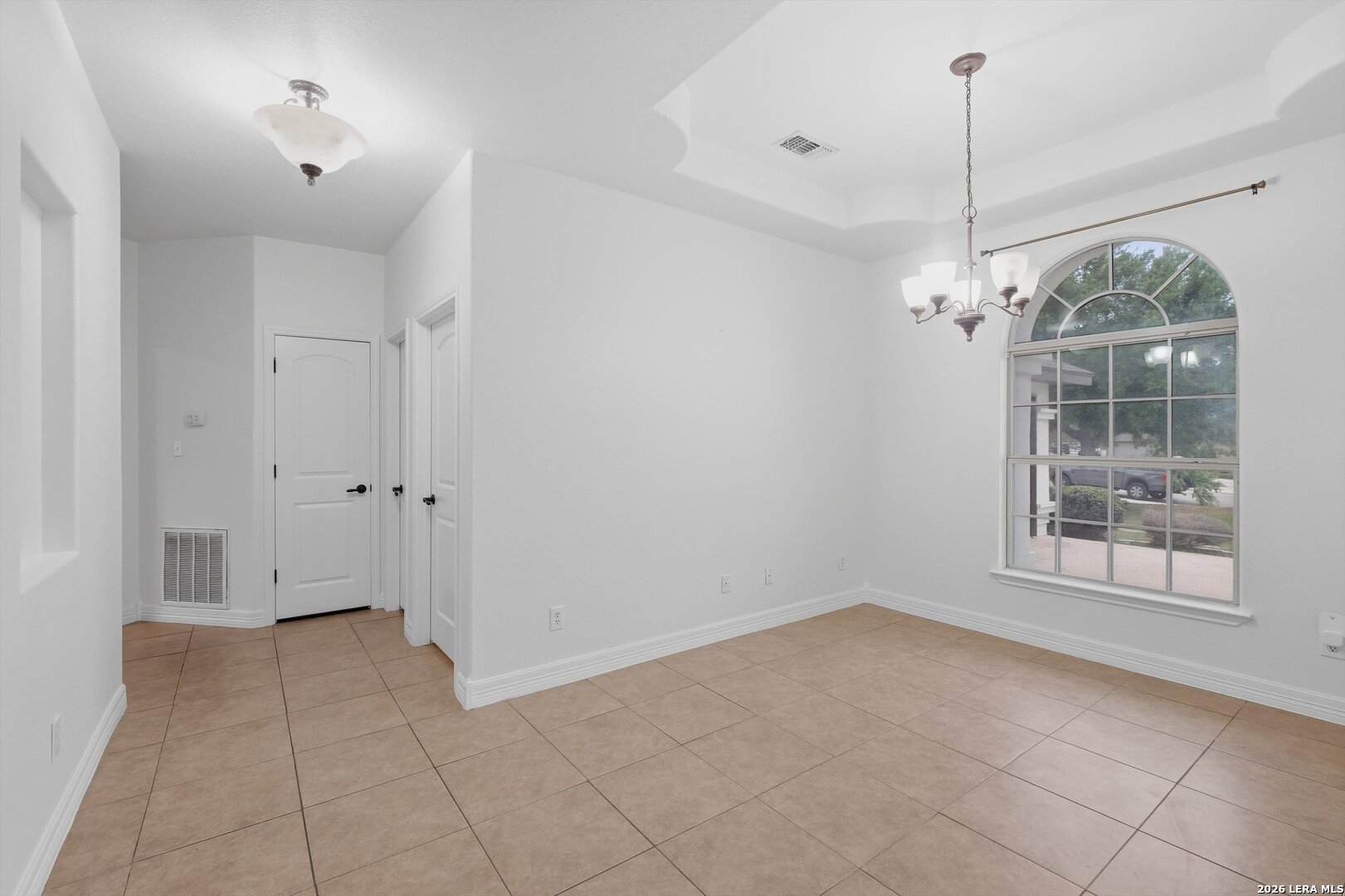 101 Lynx Circle Devine, TX 78016 - Photo 11 of 36 a view of an empty room with a window