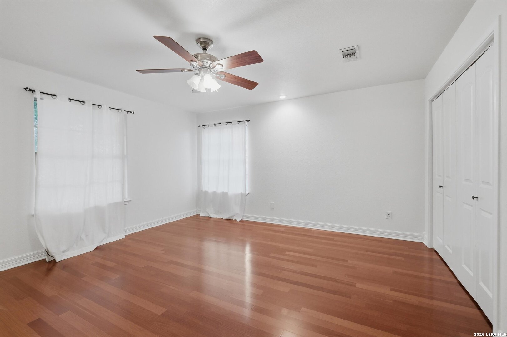 101 Lynx Circle Devine, TX 78016 - Photo 18 of 36 a view of an empty room with a window