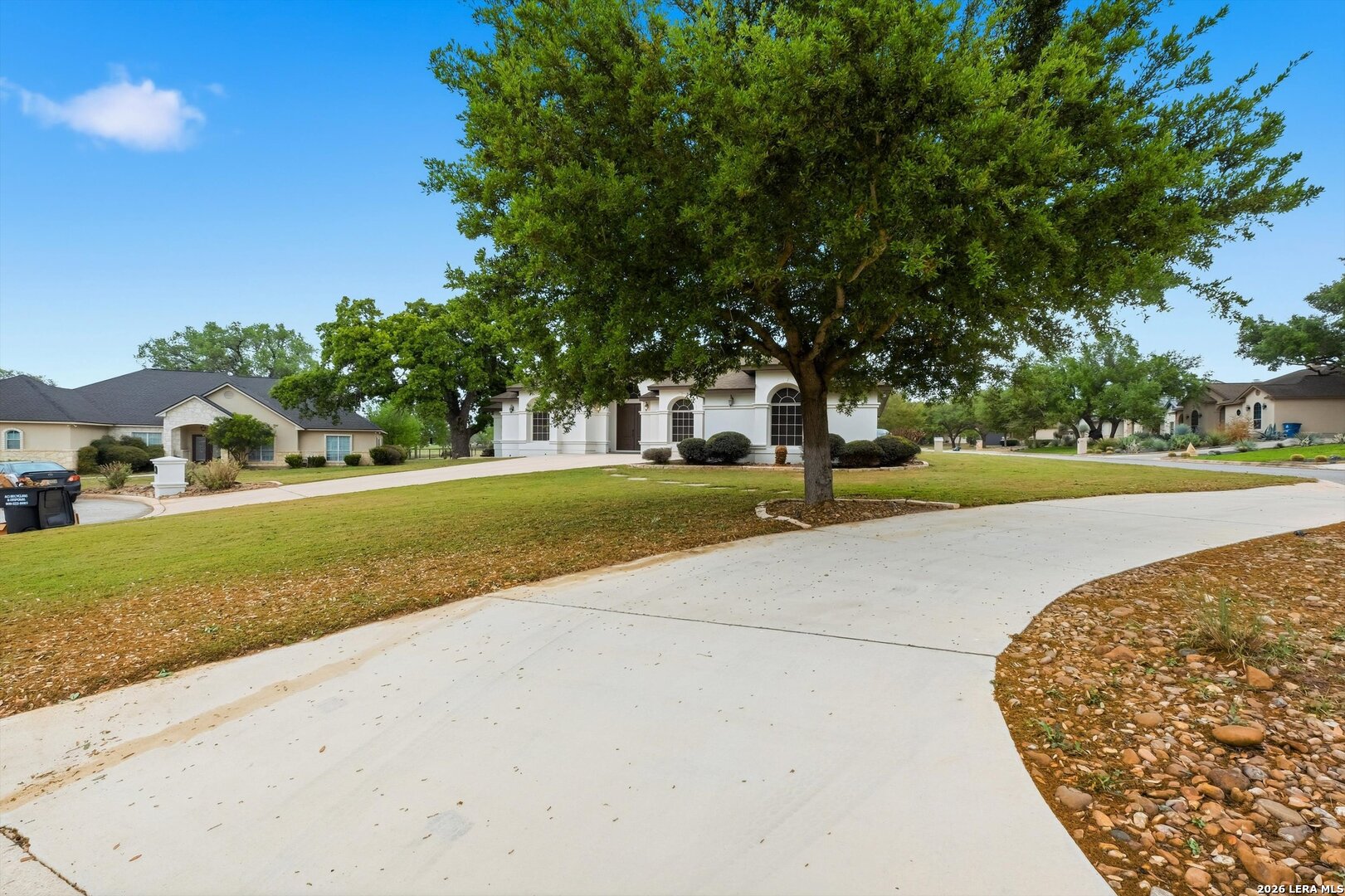 101 Lynx Circle Devine, TX 78016 - Photo 31 of 36 a view of a park with large trees