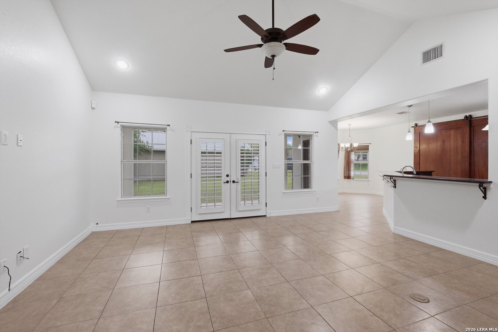 101 Lynx Circle Devine, TX 78016 - Photo 6 of 36 a view of an empty room with a window