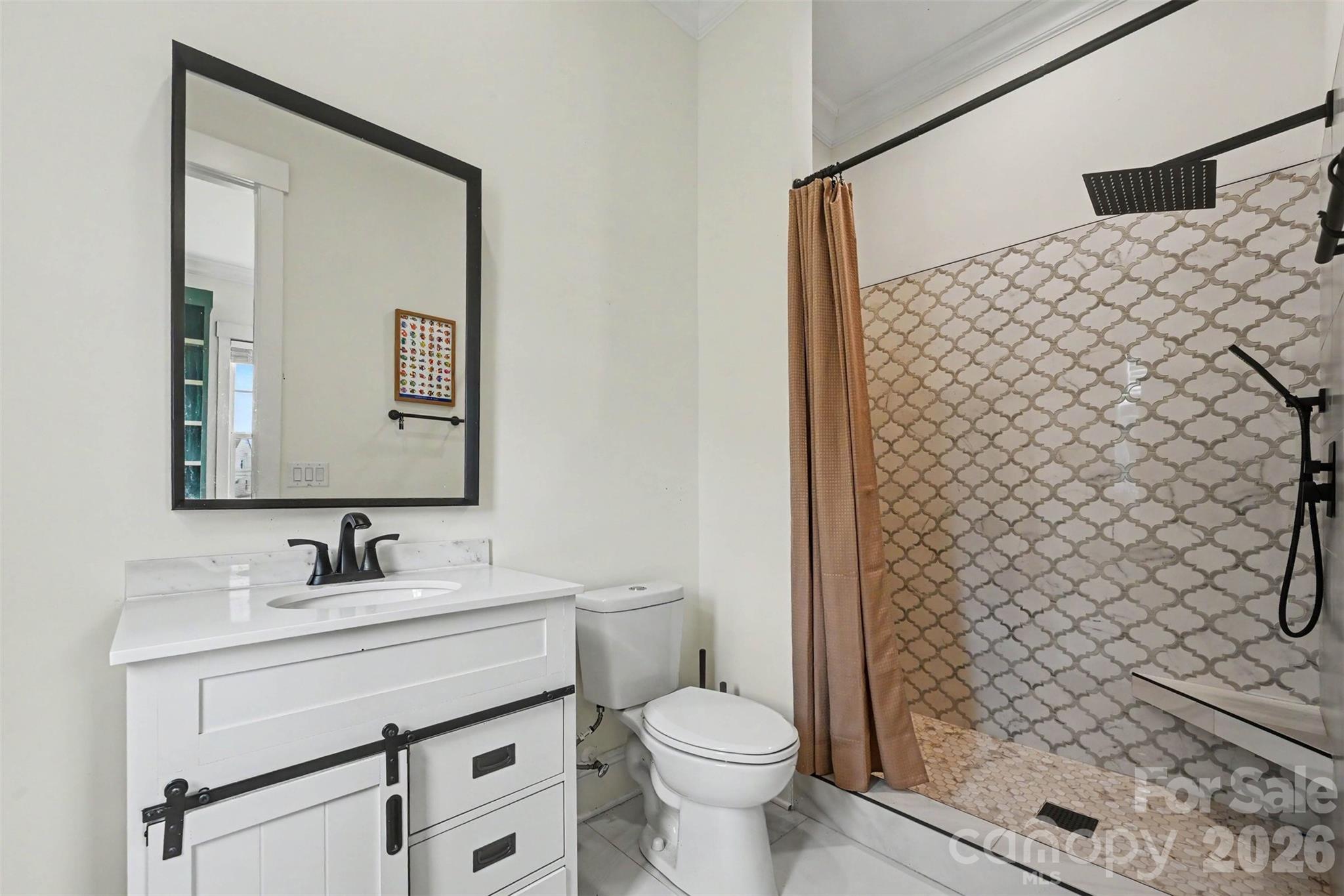 31 Ridgecrest Avenue Peachland, NC 28133 - Photo 25 of 30 a bathroom with a sink toilet and shower