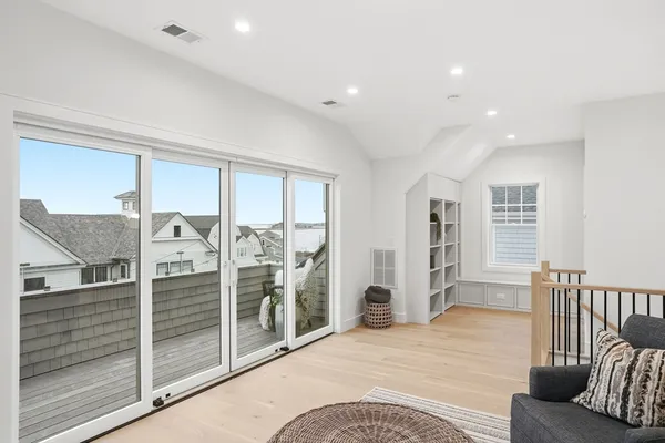 a view of a livingroom with furniture and windows