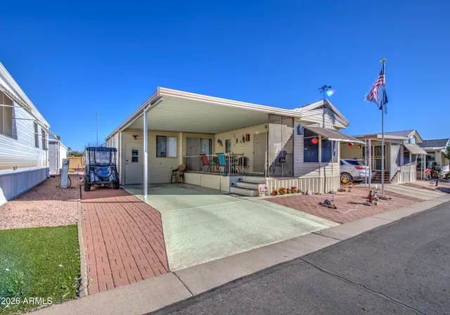 a view of a patio with swimming pool table and chairs