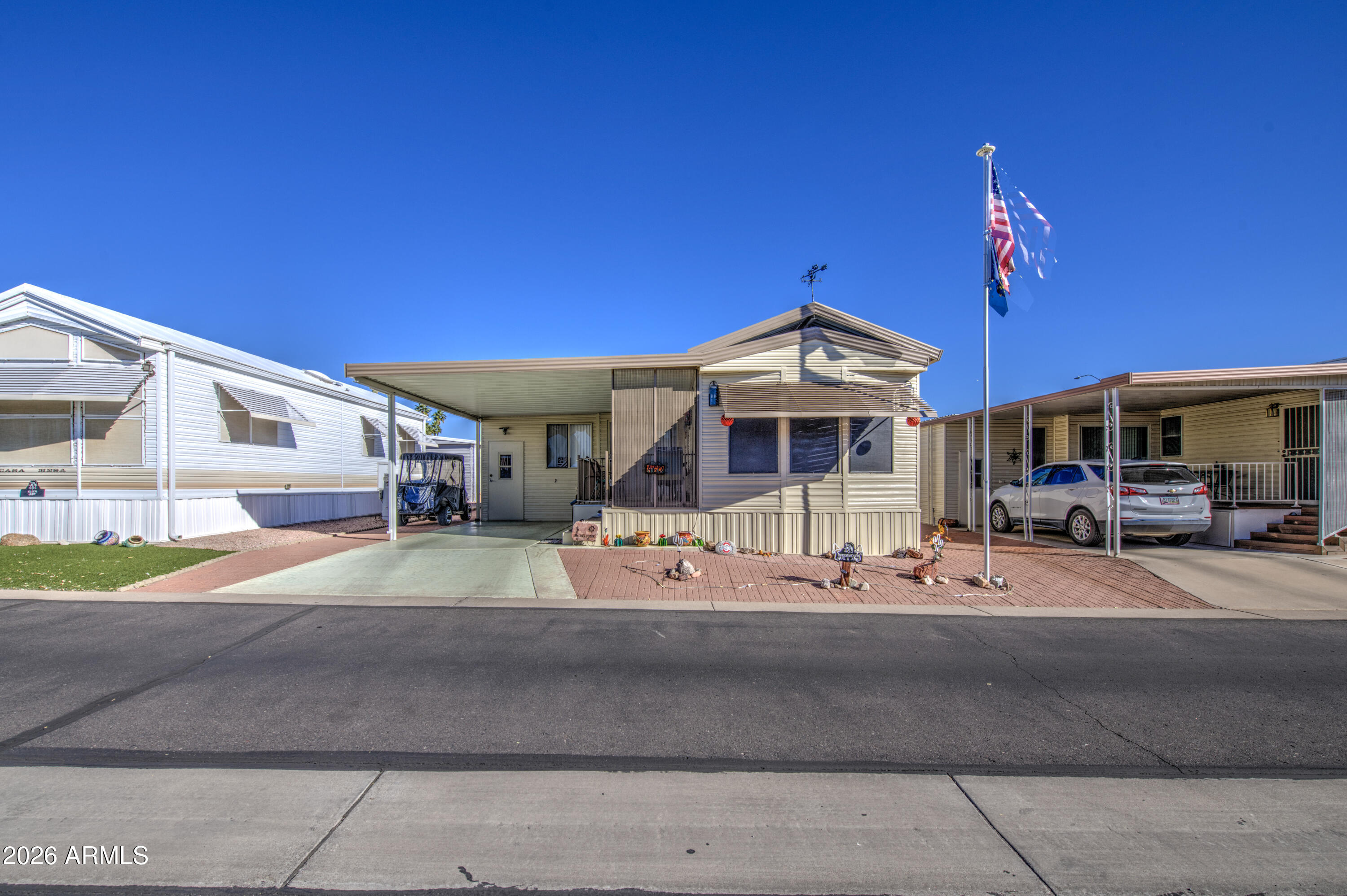 7750 East Broadway Road, Unit 463 Mesa, AZ 85208 - Photo 18 of 36 a view of a house with a street view