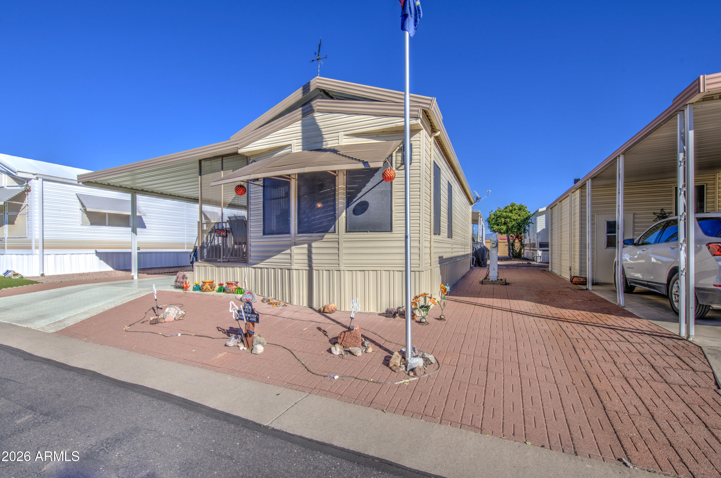 7750 East Broadway Road, Unit 463 Mesa, AZ 85208 - Photo 21 of 36 a view of a house with a patio