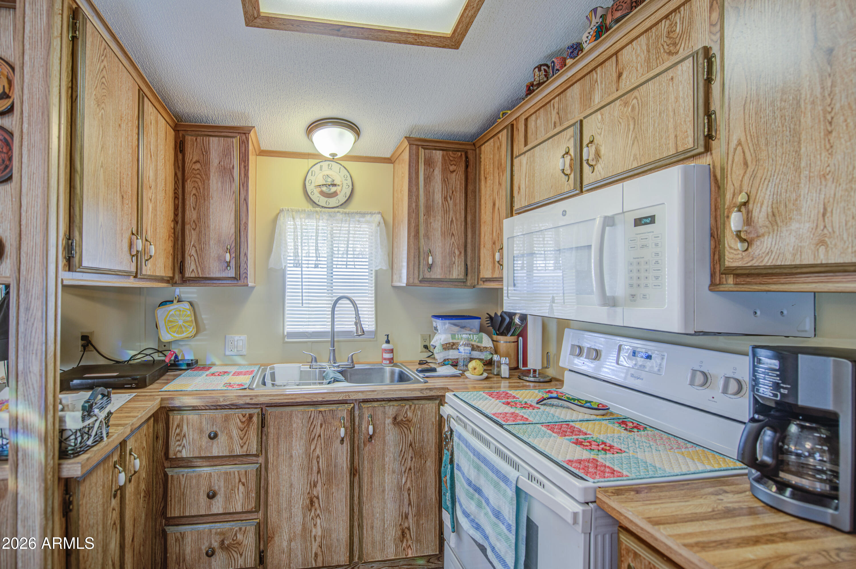 7750 East Broadway Road, Unit 463 Mesa, AZ 85208 - Photo 6 of 36 a room with storage and utility