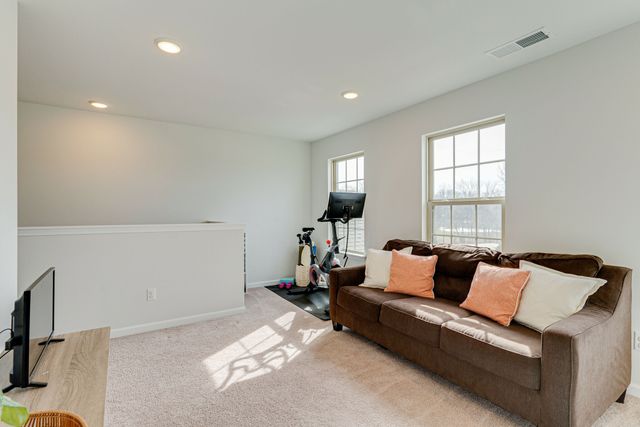 a bedroom with furniture and a couch