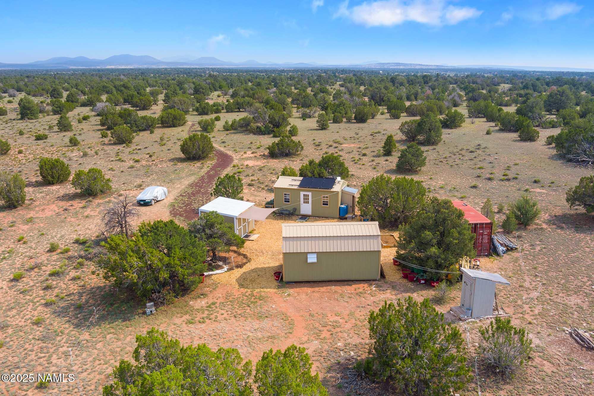 10448 South Rim Ranch Road Williams, AZ 86046 - Photo 1 of 60 a view of a city with ocean