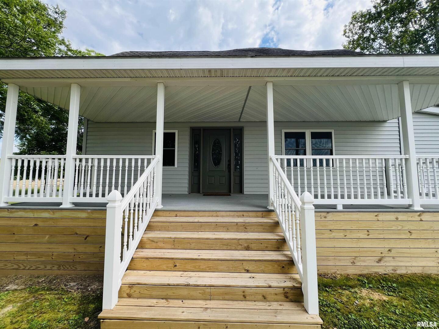 17064 Old Frankfort Road Johnston City, IL 62951 - Photo 6 of 59 a view of a house with a balcony