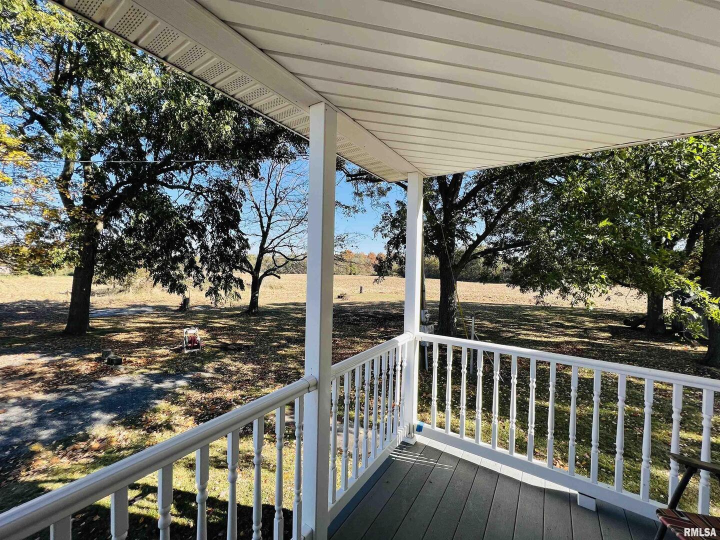 17064 Old Frankfort Road Johnston City, IL 62951 - Photo 8 of 59 a view of a porch