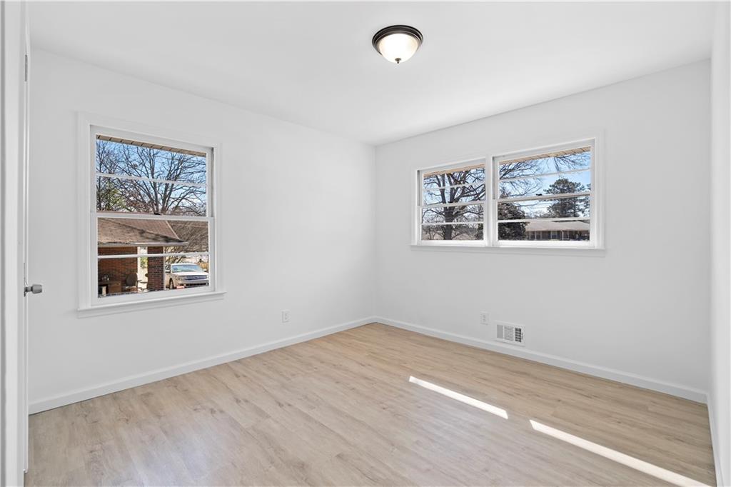 1802 Lake Harbin Road Morrow, GA 30260 - Photo 24 of 40 an empty room with a window