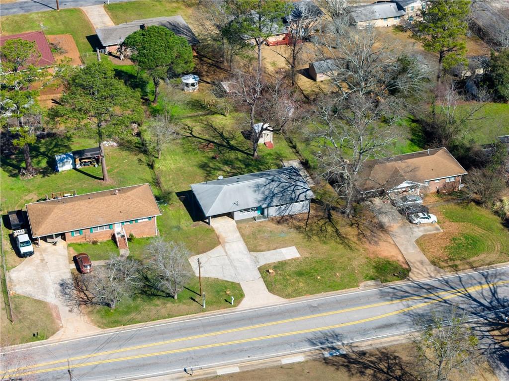 1802 Lake Harbin Road Morrow, GA 30260 - Photo 40 of 40 an aerial view of a house with a yard and garden